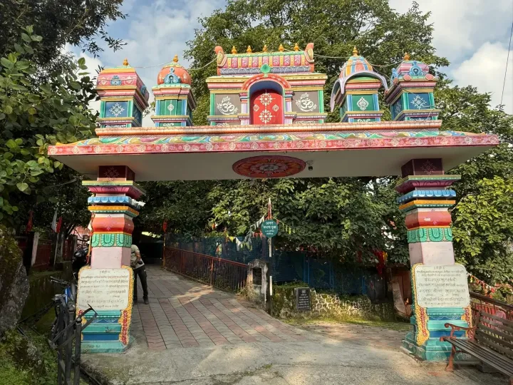 Brightly painted South Indian style gateway leading to the sacred Kalpavriksha tree in Joshimath