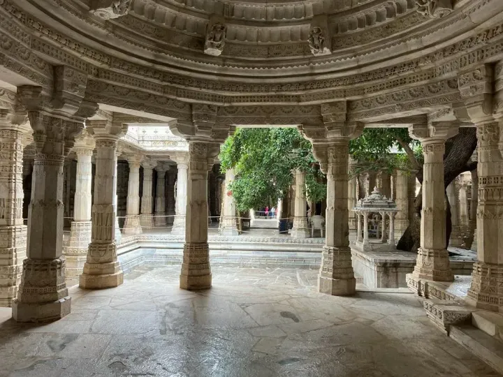 Carved marble pillars and domed ceiling inside the Jain temple at Ranakpur