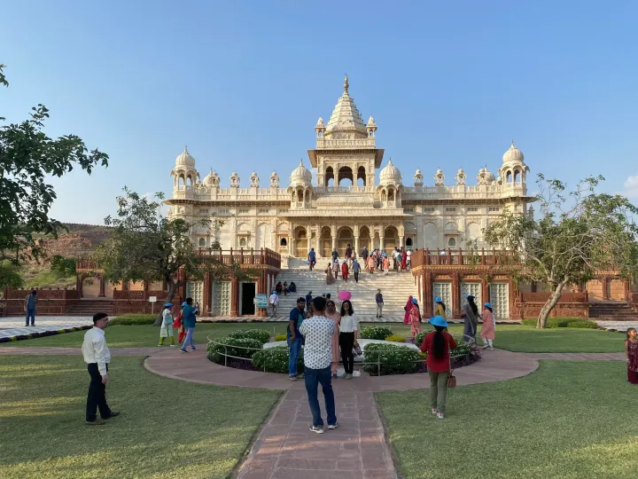 The white marble memorial of Jaswant Thada in Jodhpur with visitors on its steps